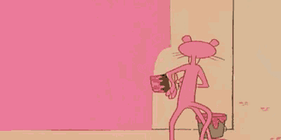 a cartoon character is standing next to a pink wall eating a cupcake .