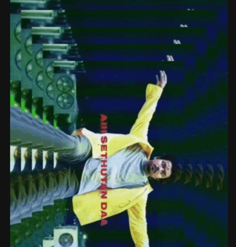 a man in a yellow jacket has the word sethuyan da on the bottom right