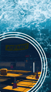 a sign that says atomic is surrounded by waves