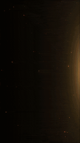 a large explosion with smoke coming out of it on a dark background