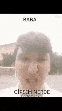 a close up of a man 's face with the words baba cipsim nerde bottom text .