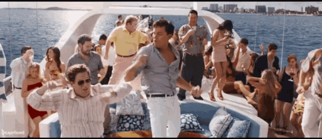 a group of people are dancing on a boat with a caption that says sugarhound