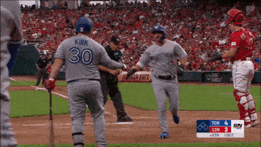 a baseball player with the number 30 on the back of his shirt