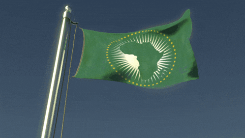 a green and white flag with a map of africa in the center