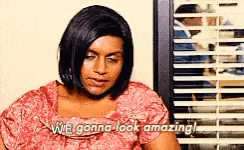 a woman in a pink shirt is sitting in front of a window with blinds and says `` we gonna look amazing '' .
