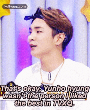 a young man wearing a bandana and a necklace says that yunho hyung wasn 't the person i liked