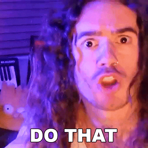 a man with long curly hair is making a funny face and says do that
