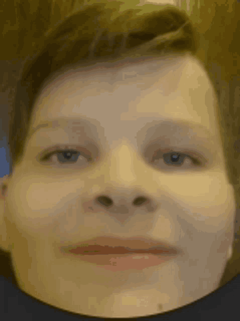 a close up of a person 's face with a circle around it