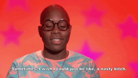 a man wearing glasses and a pink shirt says sometimes i wish i could just be like a nasty bitch