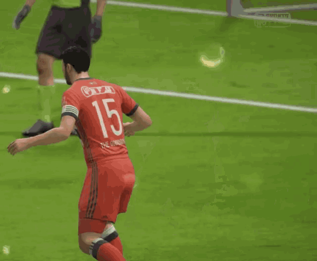 a soccer player in a red jersey with the number 10 on it