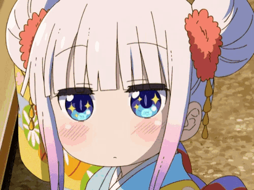 a close up of a girl with blue eyes