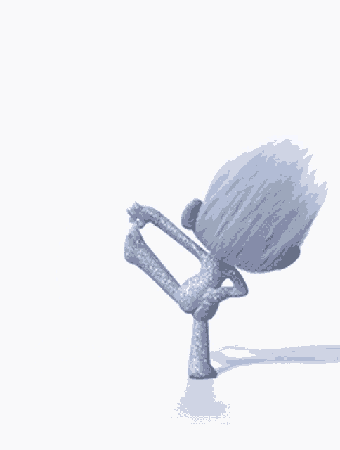 a troll with long white hair is dancing on a white background .