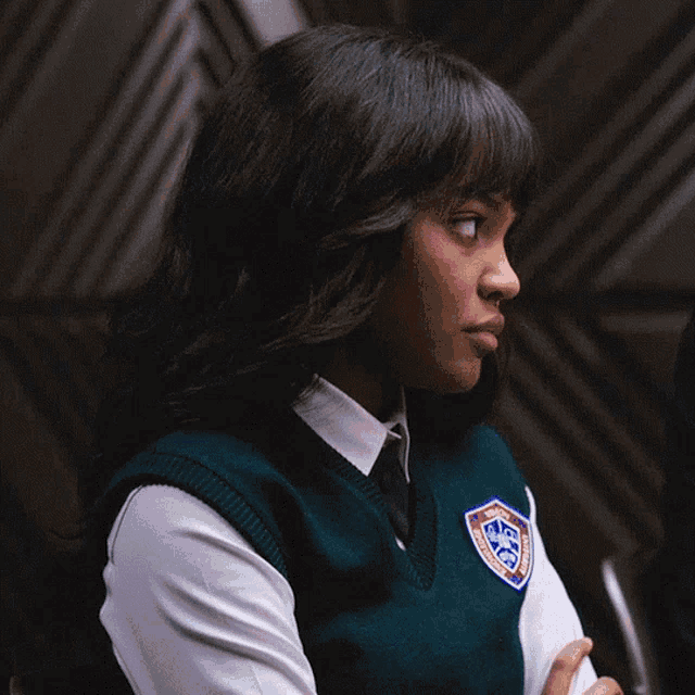 a girl in a school uniform has a badge on her vest that says ' washington d.c. police department '
