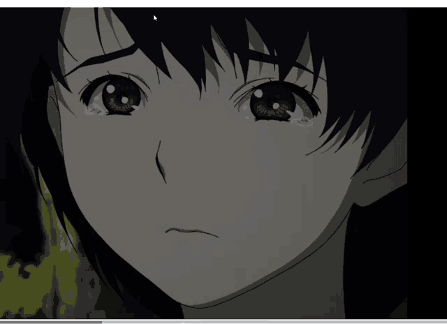 a close up of a girl 's face with tears running down her cheeks