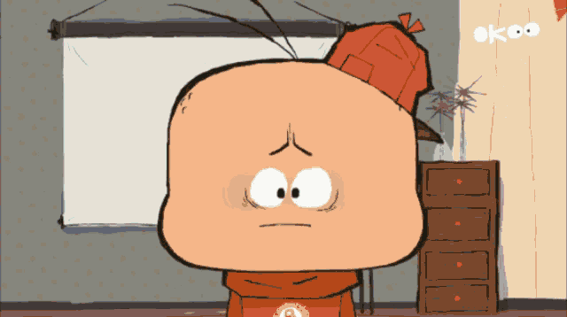 a cartoon character with a red hat and the word okeo on the wall