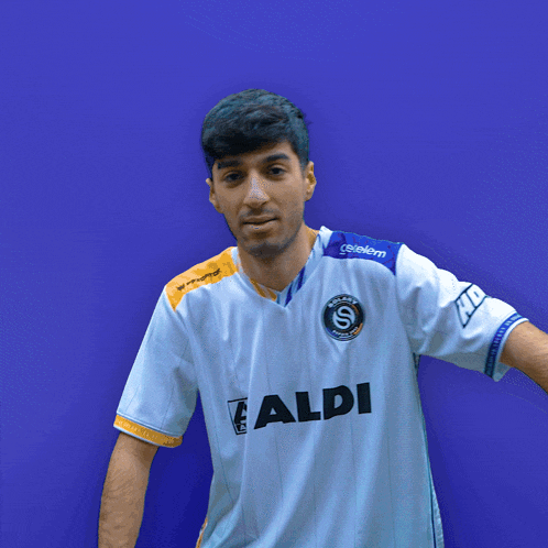 a man in a white shirt with the word di on the front