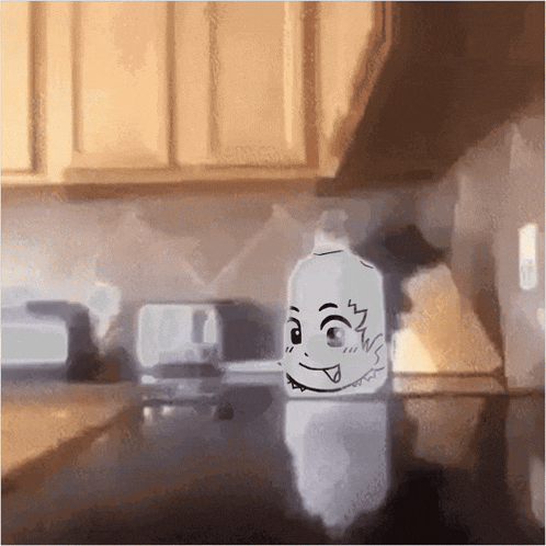 a white milk carton with a face drawn on it