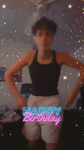 a person is dancing in a room with the words happy birthday in neon