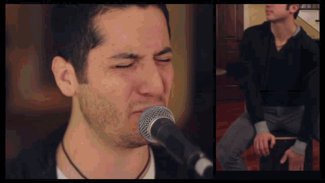 a man singing into a microphone while sitting down