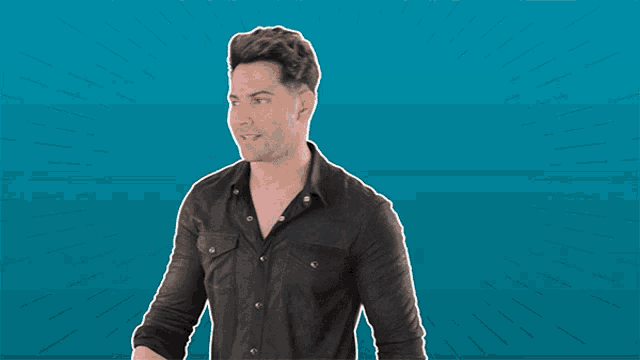 a man in a black shirt with a thought bubble above him