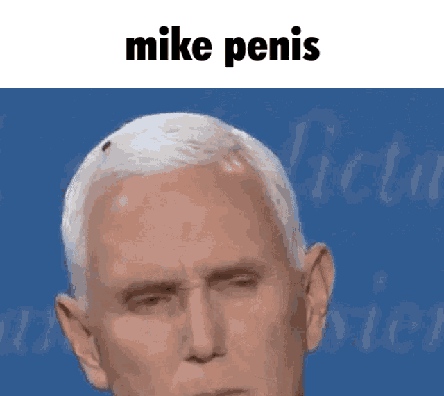 a close up of a man 's face with the words mike penis written above it .