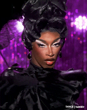 a close up of a drag queen 's face with a purple background and the words t4yce tumblr below it