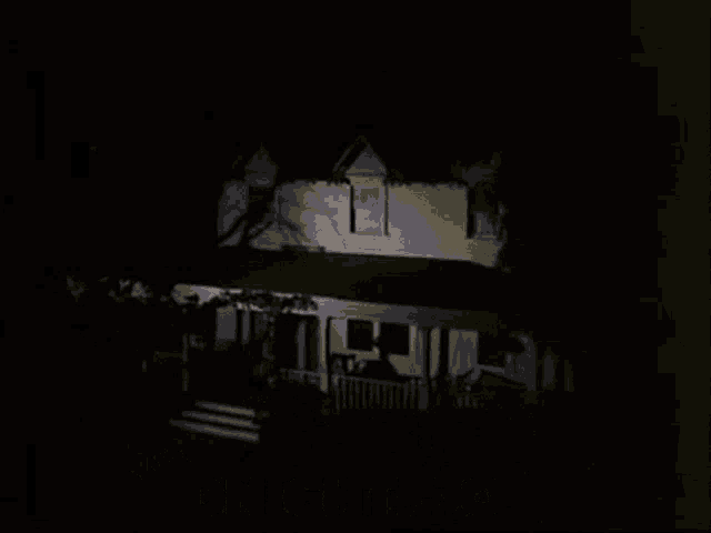 a house is lit up in the dark with the words goodnight john boy
