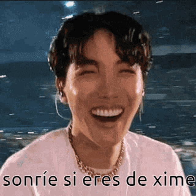a man is smiling with the words sonrie si eres de xime on the bottom