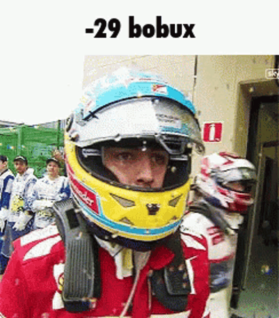 a man wearing a helmet with the word bobux on it