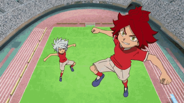 a boy with red hair is jumping in the air on a field