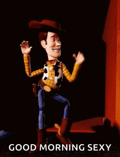 woody from toy story is dancing in front of a red wall and says good morning sexy .