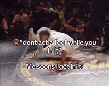 a man is doing a trick in front of a crowd and says " dont act a fool while you in it