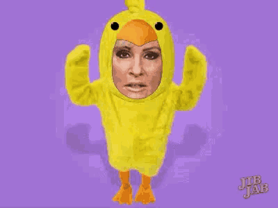 a woman is dressed in a chicken costume with a purple background