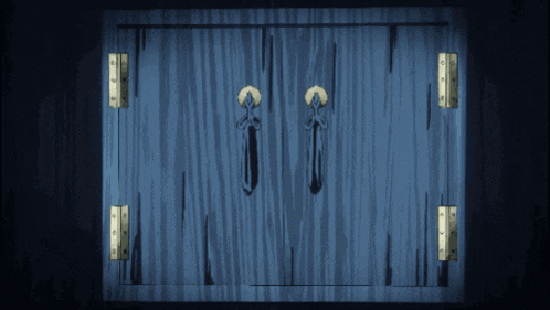 a blue door with gold hinges and a cross on the handle
