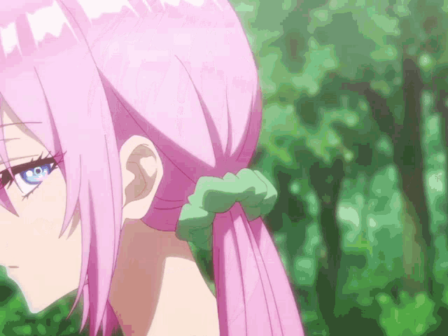 a girl with pink hair and blue eyes is wearing a green scrunchie in her hair