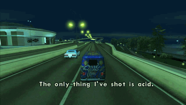 a blue van is driving down a highway with the words the only thing i 've shot is acid