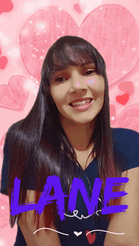 a woman is smiling with the word lane on her shirt