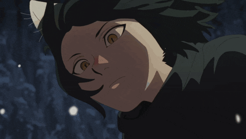 a close up of a person 's face with a black shirt on
