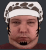 a close up of a man 's face wearing a helmet .