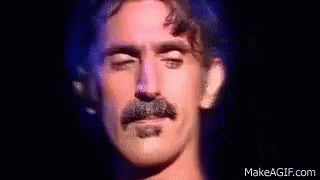 Frank Zappa Wink GIF - Frank Zappa Wink GIFs