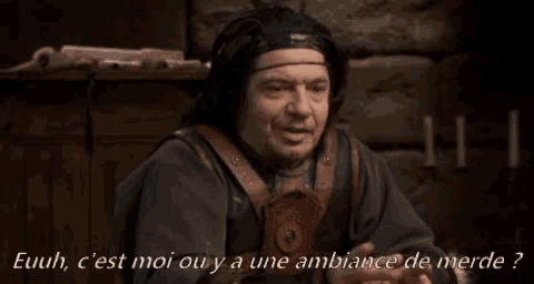 a man giving a thumbs up with the words euuh c est moi ou y a une ambiance de merde written below him