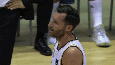 a man wearing a basketball jersey that says ' nba ' on the front