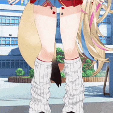 a close up of a girl 's legs in striped socks
