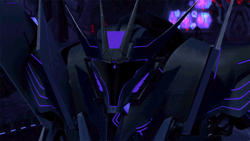 a close up of a robot with purple lights on it 's head