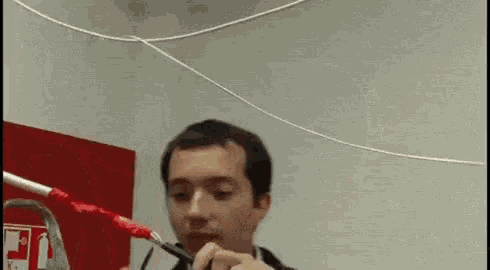 Electrician Cutting Wire GIF