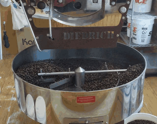 a deerrich coffee roaster filled with beans