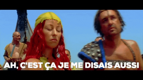 a woman with red hair is standing next to a man with the words ah c'est ca je me disais aussi written on the bottom
