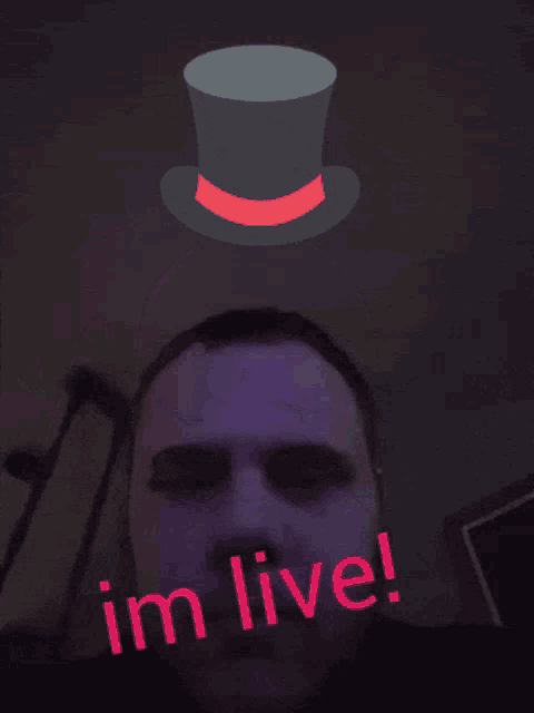 a man with a top hat on his head and the words i 'm live below him
