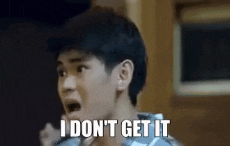 a young man is making a funny face and saying `` i do n't get it '' .