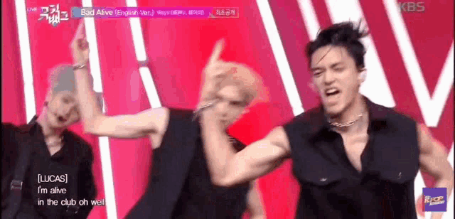 a group of men are dancing on a stage and one of them says lucas